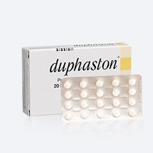 Medikament für Frauen Duphaston und Blisterpackung mit Tabletten